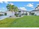 Single-story home with well-manicured lawn at 1023 San Mateo Dr, Punta Gorda, FL 33950