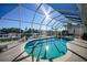 Relaxing pool and patio area with canal views at 1023 San Mateo Dr, Punta Gorda, FL 33950