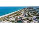 Coastal town's aerial view, beach, and ocean at 10320 Lands End Cir # 47, Placida, FL 33946