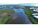 Wide shot of waterfront community and surrounding waterways at 10320 Lands End Cir # 47, Placida, FL 33946