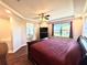 Main bedroom with ensuite bathroom and lake view at 10320 Lands End Cir # 47, Placida, FL 33946