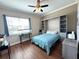 Guest bedroom with murphy bed and built-in shelves at 10320 Lands End Cir # 47, Placida, FL 33946