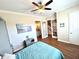 Bedroom with a queen bed, and access to a small bathroom at 10320 Lands End Cir # 47, Placida, FL 33946