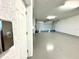 Spacious garage with epoxy floor, providing ample storage space at 10320 Lands End Cir # 47, Placida, FL 33946