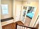 View down a hallway with a built-in bench, and access to a bedroom at 10320 Lands End Cir # 47, Placida, FL 33946