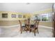 Bright dining area with view to kitchen at 109 Peckham Se St, Port Charlotte, FL 33952