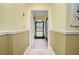 View through entryway to a screened porch at 109 Peckham Se St, Port Charlotte, FL 33952