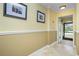 Bright entryway with two-toned walls and tiled floors at 109 Peckham Se St, Port Charlotte, FL 33952