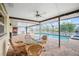 Enjoyable patio with glass top table and pool view at 109 Peckham Se St, Port Charlotte, FL 33952