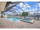 Enclosed pool and spa with water views at 109 Peckham Se St, Port Charlotte, FL 33952