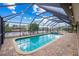 Enclosed pool and spa with water views at 109 Peckham Se St, Port Charlotte, FL 33952