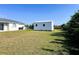 Large backyard with shed and grassy area at 12143 & 12151 Dubarry Ave, Port Charlotte, FL 33981