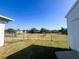 Backyard view with a shed and chain link fence at 12143 & 12151 Dubarry Ave, Port Charlotte, FL 33981