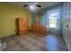 Bedroom with double door closet and tiled floor at 12143 & 12151 Dubarry Ave, Port Charlotte, FL 33981