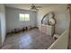 Bedroom with tiled floors and a vanity at 12143 & 12151 Dubarry Ave, Port Charlotte, FL 33981