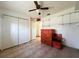 Bedroom with double door closet and tiled floor at 12143 & 12151 Dubarry Ave, Port Charlotte, FL 33981