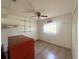 Bedroom with built-in shelving and tiled floor at 12143 & 12151 Dubarry Ave, Port Charlotte, FL 33981