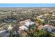 Aerial view showing a single-story home with a shed and large yard at 13204 Kakapo Ave, Port Charlotte, FL 33981