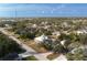 Aerial view of a single-story house on a spacious lot at 13204 Kakapo Ave, Port Charlotte, FL 33981