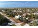 Aerial view of a single-story house on a spacious lot at 13204 Kakapo Ave, Port Charlotte, FL 33981