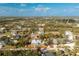 Aerial view of a single-story home with a large yard at 13204 Kakapo Ave, Port Charlotte, FL 33981