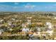 Aerial view showcasing a single-story house in a residential neighborhood at 13204 Kakapo Ave, Port Charlotte, FL 33981