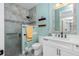 Bathroom with walk-in shower, toilet and vanity at 13204 Kakapo Ave, Port Charlotte, FL 33981