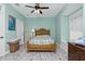 Bedroom with wooden bed frame and window seat at 13204 Kakapo Ave, Port Charlotte, FL 33981