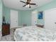 Bedroom with wooden bed frame and window seat at 13204 Kakapo Ave, Port Charlotte, FL 33981