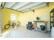 Bright garage with shelving, tools, and bicycles at 13204 Kakapo Ave, Port Charlotte, FL 33981