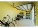 Bright garage with shelving, tools, and bicycles at 13204 Kakapo Ave, Port Charlotte, FL 33981