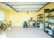 Bright garage with shelving, tools, and bicycles at 13204 Kakapo Ave, Port Charlotte, FL 33981