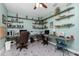 Bright home office with built-in shelving and workspace at 13204 Kakapo Ave, Port Charlotte, FL 33981