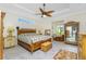 Spacious main bedroom with king-size bed and ceiling fan at 13204 Kakapo Ave, Port Charlotte, FL 33981