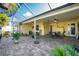 Bright screened porch with pavers and plants at 13204 Kakapo Ave, Port Charlotte, FL 33981