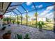 Spacious screened porch overlooking the backyard at 13204 Kakapo Ave, Port Charlotte, FL 33981