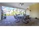 Spacious screened-in porch, perfect for outdoor relaxation at 13204 Kakapo Ave, Port Charlotte, FL 33981