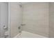 Clean bathroom with a large shower and tile surround at 1350 Aqua View Ln, Englewood, FL 34223