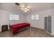 Bedroom with a king-size bed and ceiling fan at 1350 Aqua View Ln, Englewood, FL 34223