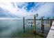 Private boat dock with lift, perfect for enjoying water activities at 1350 Aqua View Ln, Englewood, FL 34223