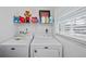 Laundry room with Maytag washer and dryer at 1350 Aqua View Ln, Englewood, FL 34223