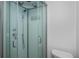 Updated shower with glass enclosure and modern fixtures at 1350 Aqua View Ln, Englewood, FL 34223