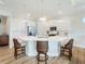 Modern kitchen with white cabinetry, large island, and stainless steel appliances at 13707 Begonia Cir, Port Charlotte, FL 33981