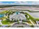 Aerial view of community clubhouse, pool, and amenities at 1496 Mableton Dr, Port Charlotte, FL 33953