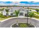 Community clubhouse with welcoming entryway and landscaping at 1496 Mableton Dr, Port Charlotte, FL 33953