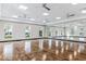 Bright dance studio featuring hardwood floors and large mirrors at 1496 Mableton Dr, Port Charlotte, FL 33953