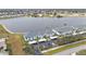 Wide aerial view of waterfront condo building and surrounding area at 1501 San Cristobal Ave # 1205, Punta Gorda, FL 33983