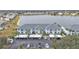 Aerial view of condo building with covered parking and lake view at 1501 San Cristobal Ave # 1205, Punta Gorda, FL 33983