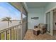 Relaxing balcony overlooking a lake with comfortable seating at 1501 San Cristobal Ave # 1205, Punta Gorda, FL 33983