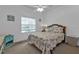 Cozy bedroom with a double bed and beach decor at 1501 San Cristobal Ave # 1205, Punta Gorda, FL 33983